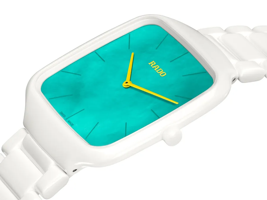 Rado True Square Thinline x Tan Jianci at an angle, showing the slim 5 mm case in white ceramic